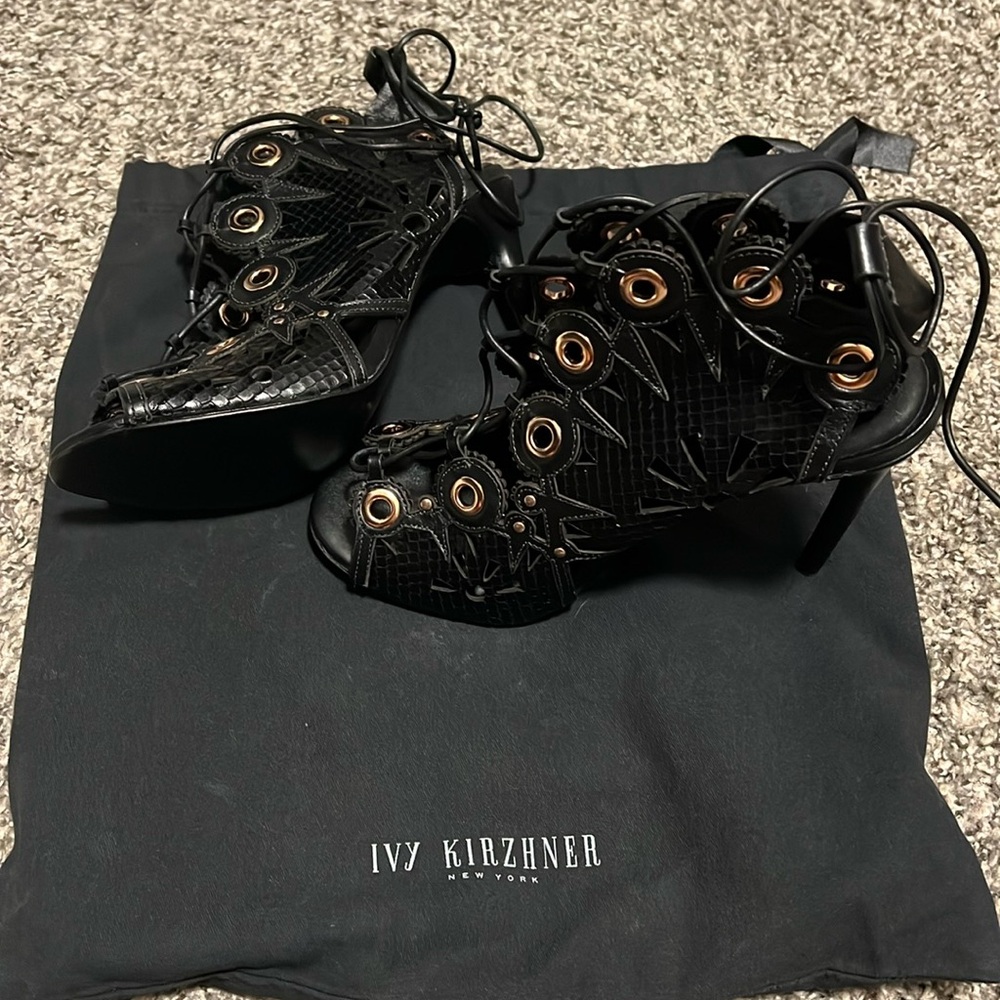 Black heels with gold accent